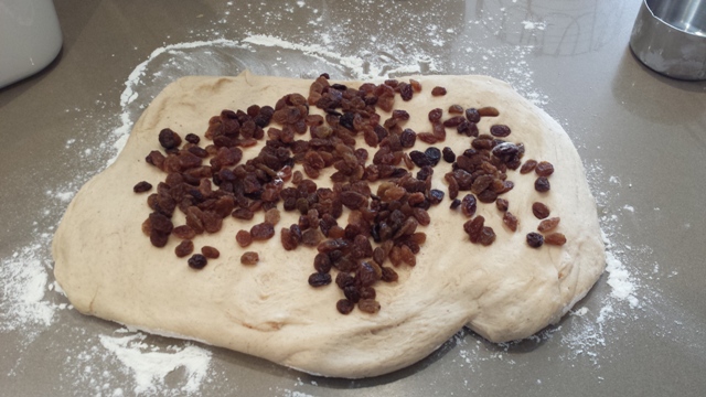 Dough ready for sultanas to be kneaded in