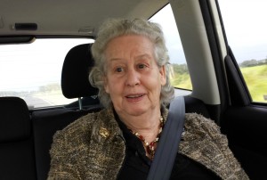 Mum in the car on the way to her new home.