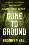 Cover of Gone To Ground by Bronwyn Hall featuring a dark green jungle background with the title in large white font and the author’s name and cover quotes in yellow.